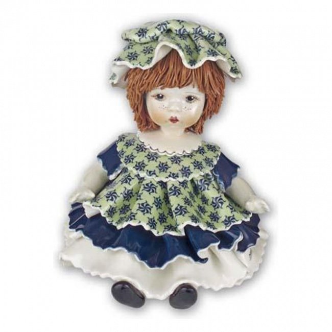 Фарфоровая статуэтка "Кукла, сидящая в зенёно-синем платье" - 6392